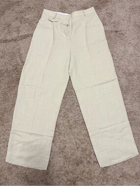 COS rayon line blend pleated trousers size 10
Like new
